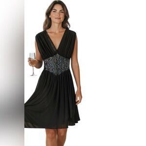 NEW LEAF BY SAMIR Vintage 
 .  Elegant Black Midi Dress with Sequin Detail